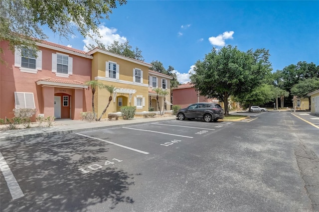 1041 Park Ridge Cir, Kissimmee, FL 34746 - view of uncovered parking lot