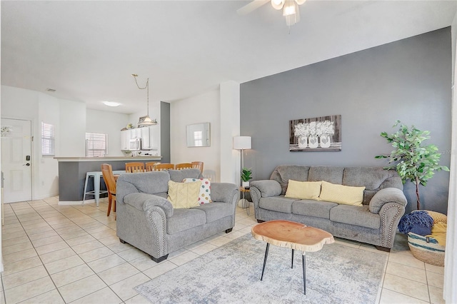 1041 Park Ridge Cir, Kissimmee, FL 34746 - living area with light tile patterned flooring and a ceiling fan