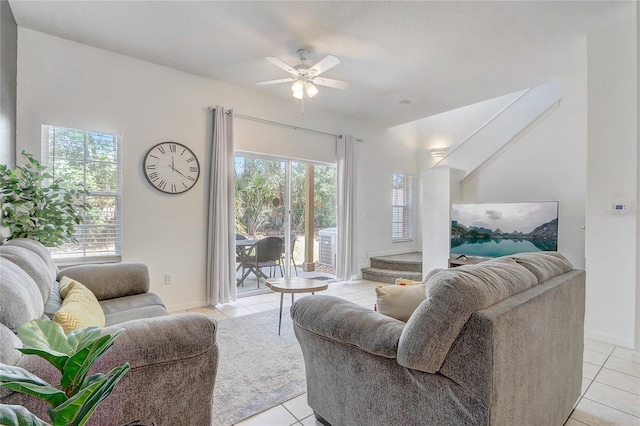 1041 Park Ridge Cir, Kissimmee, FL 34746 - living area featuring baseboards, ceiling fan, and light tile patterned flooring