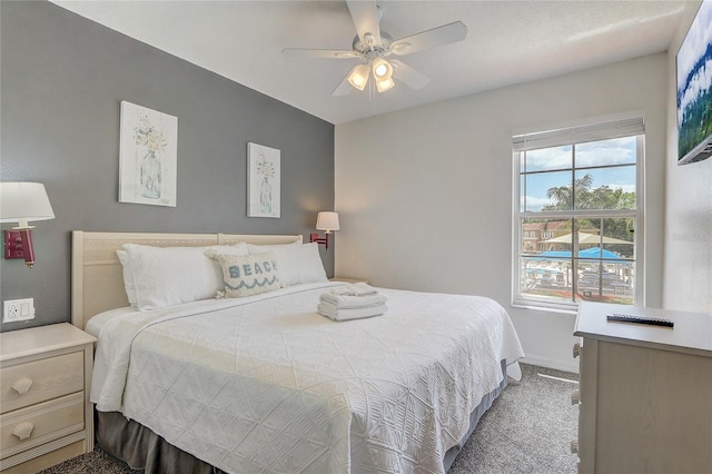 1041 Park Ridge Cir, Kissimmee, FL 34746 - carpeted bedroom featuring baseboards and ceiling fan