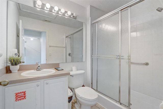 1041 Park Ridge Cir, Kissimmee, FL 34746 - bathroom with vanity, a stall shower, visible vents, and toilet