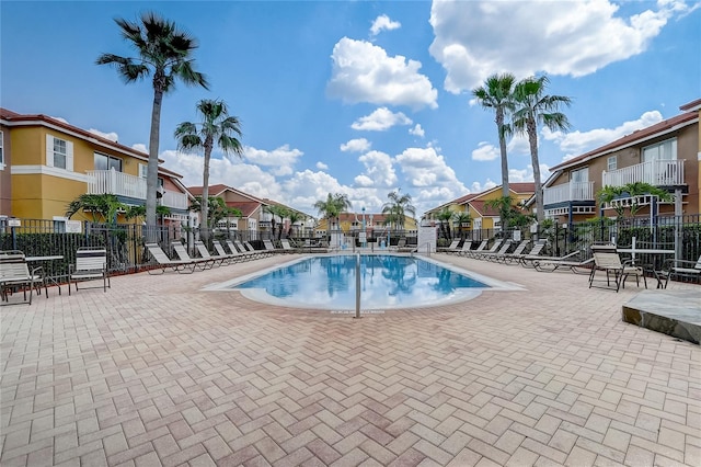 1041 Park Ridge Cir, Kissimmee, FL 34746 - pool featuring a residential view, fence, and a patio
