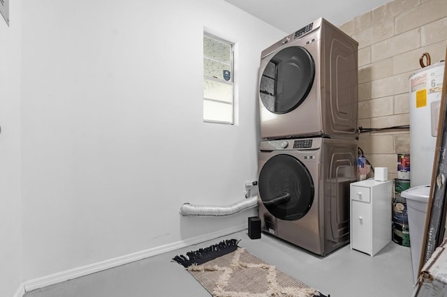 laundry room with laundry area and stacked washing maching and dryer