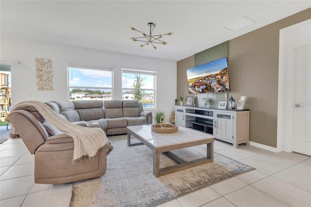 1312 Axel Graeson Ave, Kissimmee, FL 34744 - living area with baseboards, a notable chandelier, and light tile patterned floors