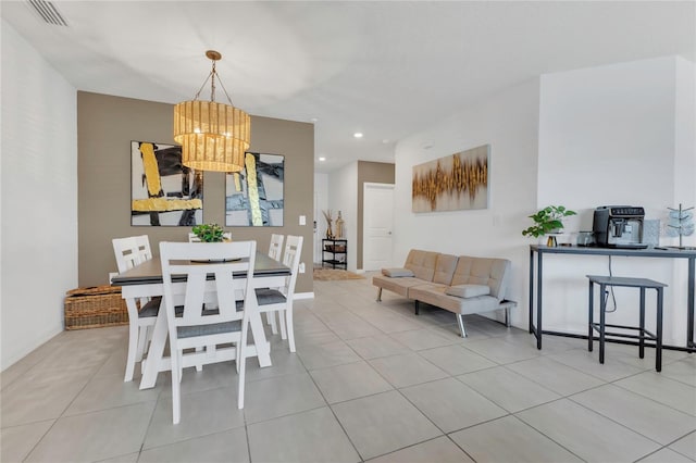 1312 Axel Graeson Ave, Kissimmee, FL 34744 - dining space with an inviting chandelier, tile patterned flooring, visible vents, baseboards, and recessed lighting