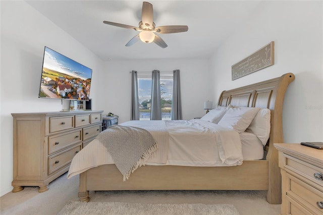 1312 Axel Graeson Ave, Kissimmee, FL 34744 - bedroom with light colored carpet and a ceiling fan
