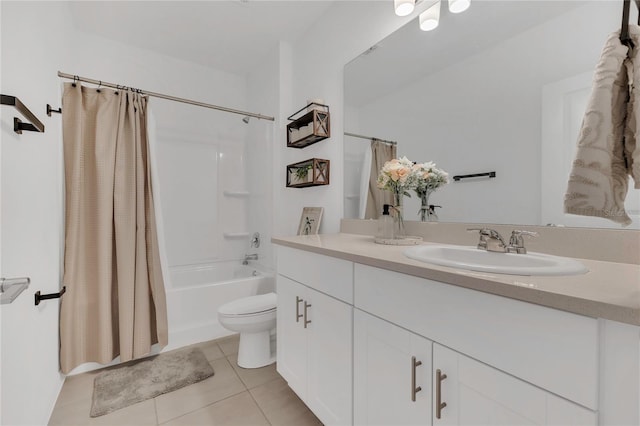 1312 Axel Graeson Ave, Kissimmee, FL 34744 - bathroom with vanity, shower / tub combo with curtain, tile patterned floors, and toilet