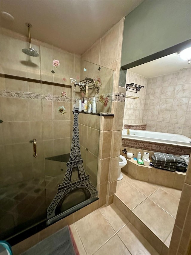 300 Broadview Ave, Altamonte Springs, FL 32701 - bathroom featuring tile patterned floors, a stall shower, a bath, toilet, and tile walls