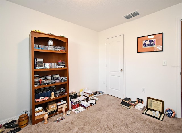 35734 Rose Moss Ave, Leesburg, FL 34788 - misc room featuring visible vents and carpet flooring