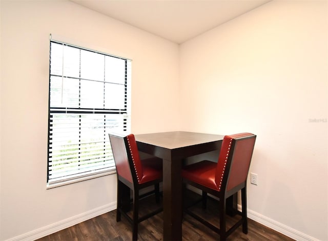35734 Rose Moss Ave, Leesburg, FL 34788 - dining space featuring baseboards and dark wood finished floors