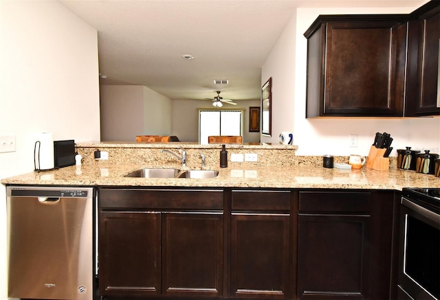 35734 Rose Moss Ave, Leesburg, FL 34788 - kitchen with light stone countertops, dark brown cabinets, a sink, dishwasher, and electric stove