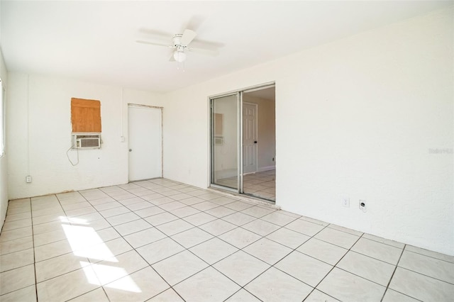 unfurnished room with a ceiling fan, light tile patterned floors, and cooling unit