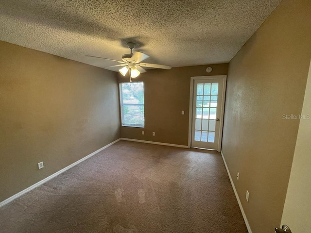 5164 Conroy Rd Unit 1526, Orlando, FL 32811 - spare room with a ceiling fan, carpet floors, a textured ceiling, and baseboards
