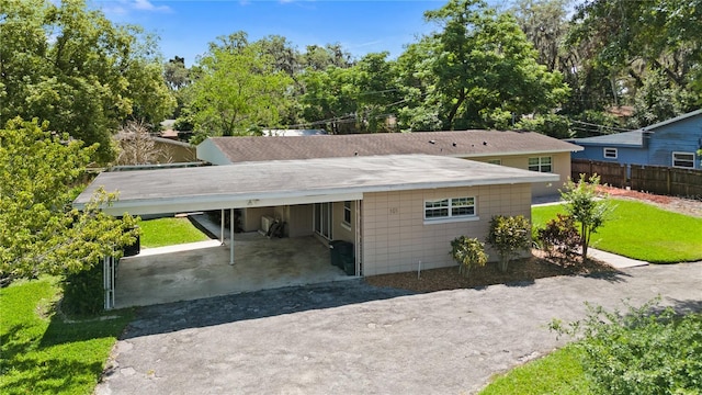 101 E Lauren Ct, Fern Park, FL 32730 - view of front of home with asphalt driveway and a carport