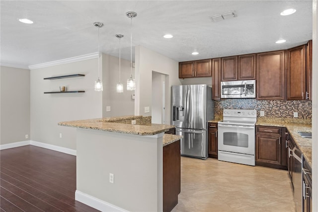 101 E Lauren Ct, Fern Park, FL 32730 - kitchen featuring stainless steel appliances, light stone counters, ornamental molding, tasteful backsplash, and baseboards