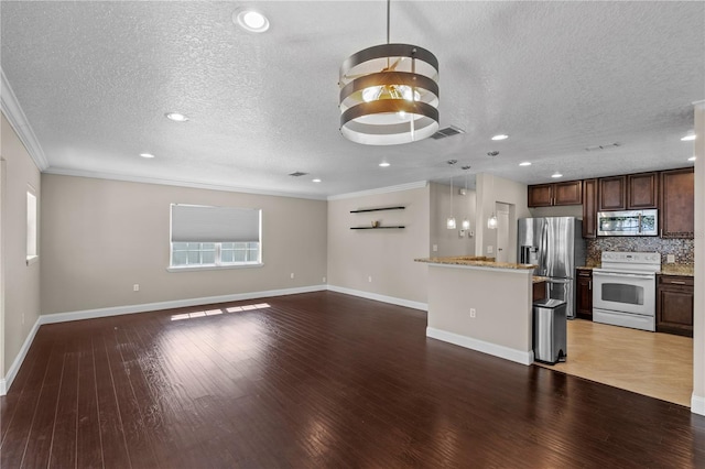 101 E Lauren Ct, Fern Park, FL 32730 - unfurnished living room with crown molding, a textured ceiling, wood finished floors, baseboards, and recessed lighting