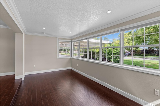 101 E Lauren Ct, Fern Park, FL 32730 - empty room with baseboards, crown molding, a textured ceiling, wood finished floors, and recessed lighting