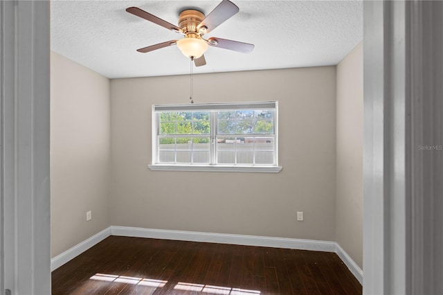 101 E Lauren Ct, Fern Park, FL 32730 - spare room with dark wood-style flooring, a ceiling fan, baseboards, and a textured ceiling