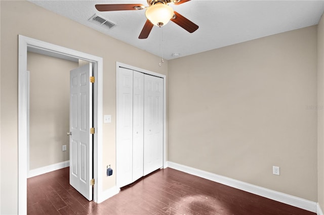 101 E Lauren Ct, Fern Park, FL 32730 - unfurnished bedroom with wood finished floors, baseboards, a closet, and ceiling fan