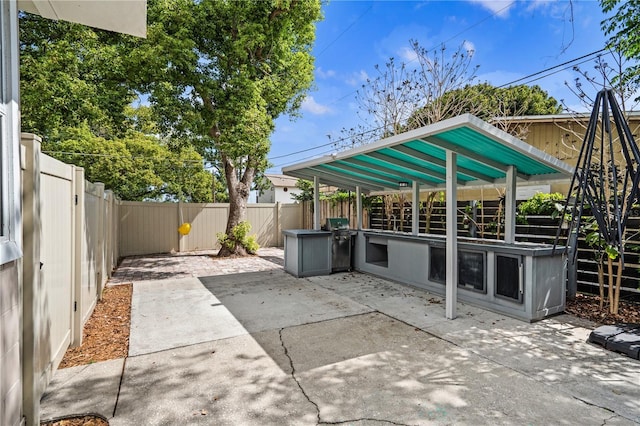 101 E Lauren Ct, Fern Park, FL 32730 - view of patio / terrace with a fenced backyard and an outdoor kitchen