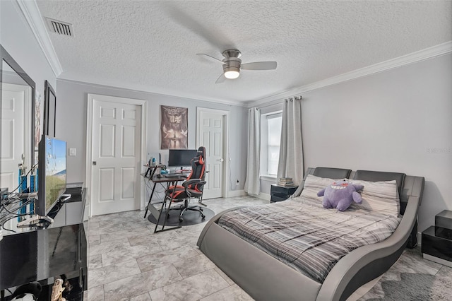 1450 Belfiore Way, Windermere, FL 34786 - bedroom with ornamental molding, a textured ceiling, ceiling fan, a desk, and a closet