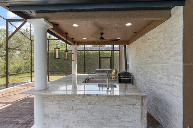 1450 Belfiore Way, Windermere, FL 34786 - view of patio / terrace featuring exterior kitchen, glass enclosure, and a ceiling fan