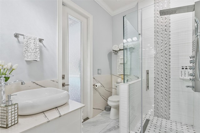 1450 Belfiore Way, Windermere, FL 34786 - full bathroom featuring a shower stall, tile walls, ornamental molding, vanity, and wainscoting