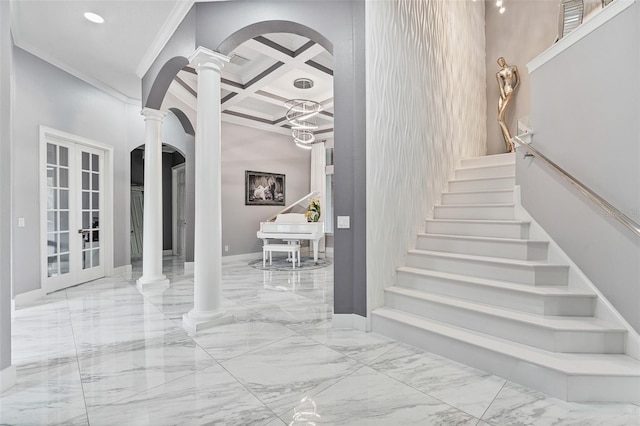 1450 Belfiore Way, Windermere, FL 34786 - stairs featuring decorative columns, arched walkways, marble tiled flooring, coffered ceiling, and ornamental molding