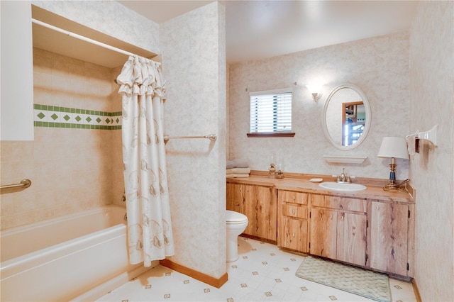 full bathroom featuring vanity, shower / bath combo, and toilet
