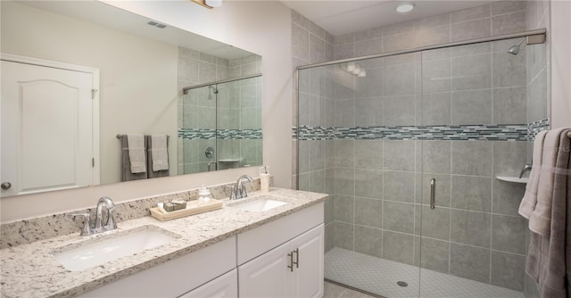 25416 Jubal St, Punta Gorda, FL 33955 - bathroom with a sink and a stall shower