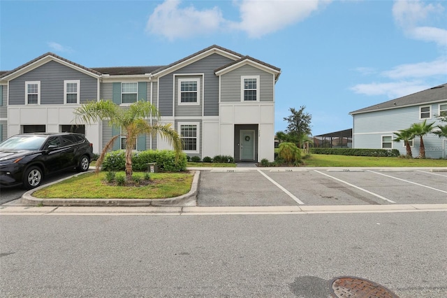 7554 Oak Spring Ln, Davenport, FL 33837 - view of property featuring uncovered parking