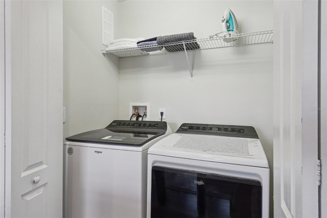 7554 Oak Spring Ln, Davenport, FL 33837 - washroom featuring independent washer and dryer
