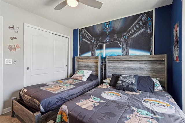 7554 Oak Spring Ln, Davenport, FL 33837 - bedroom with a ceiling fan and a closet