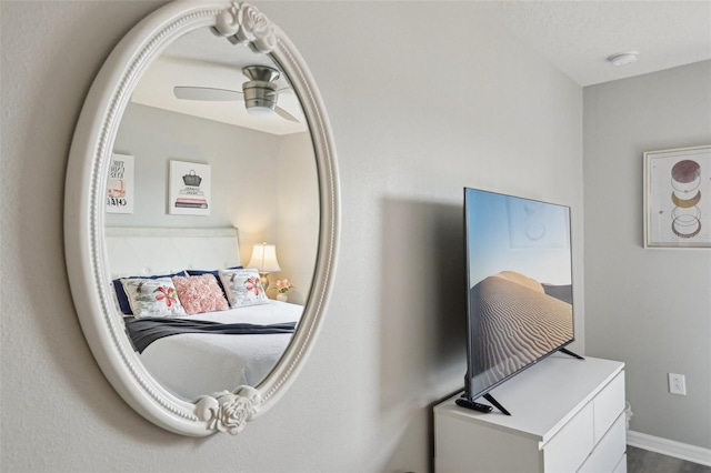 7554 Oak Spring Ln, Davenport, FL 33837 - bedroom featuring ceiling fan