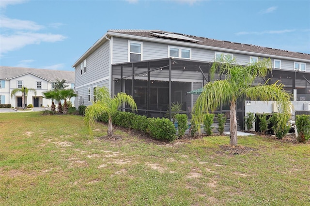 7554 Oak Spring Ln, Davenport, FL 33837 - back of house featuring a yard