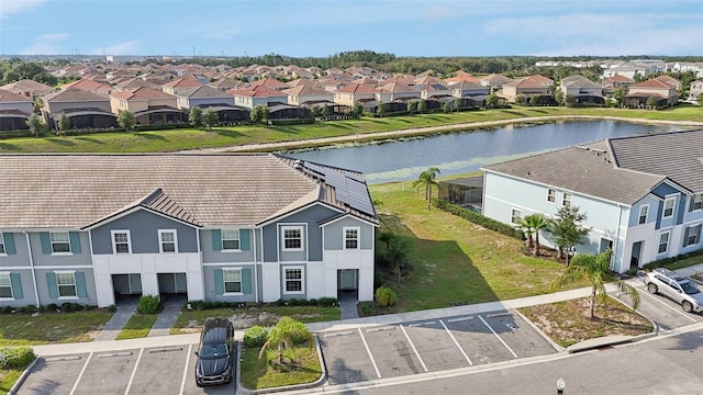 7554 Oak Spring Ln, Davenport, FL 33837 - aerial perspective of suburban area featuring a nearby body of water