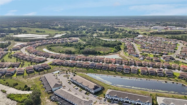 7554 Oak Spring Ln, Davenport, FL 33837 - aerial overview of property's location featuring nearby suburban area and a large body of water