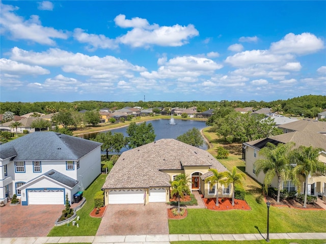 aerial view featuring a water view and a residential view