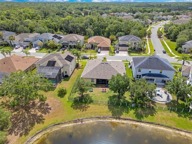 aerial view featuring a water view and a residential view