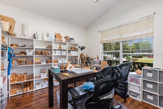 home office with plenty of natural light, wood finished floors, and lofted ceiling
