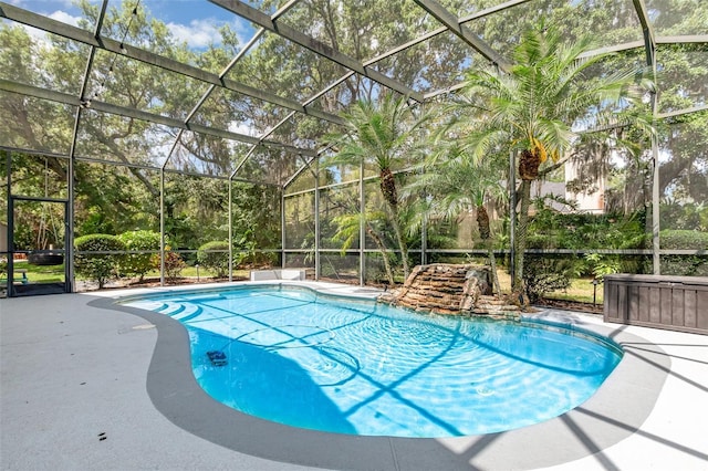 outdoor pool featuring a patio and a lanai