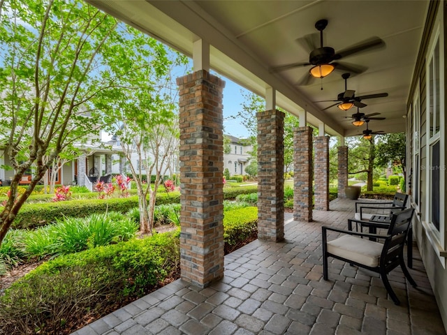 view of patio with a porch and ceiling fan