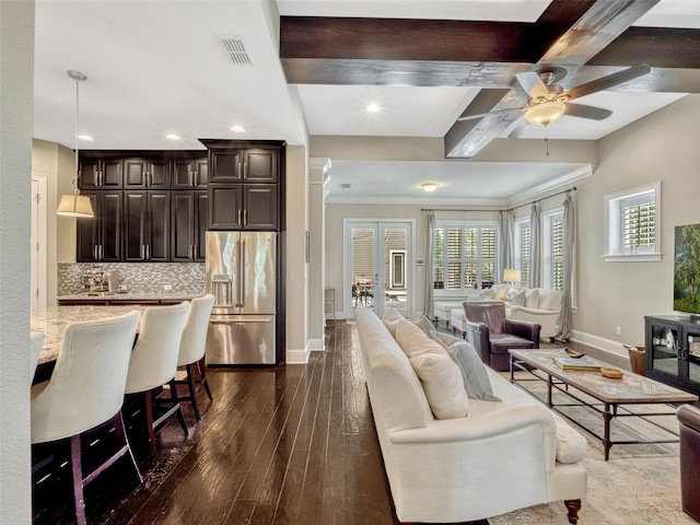 living room featuring visible vents, baseboards, ceiling fan, dark wood-type flooring, and recessed lighting