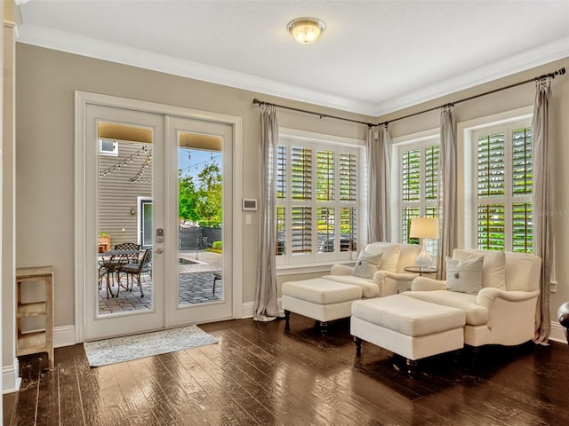 entryway featuring crown molding, dark wood-style flooring, and baseboards