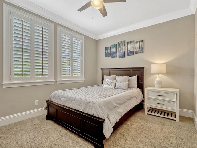 bedroom featuring carpet floors, baseboards, and multiple windows