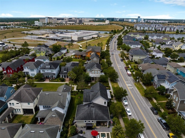 aerial view with a water view and a residential view