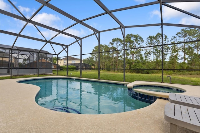 view of swimming pool with a yard, a pool with connected hot tub, a lanai, and a patio