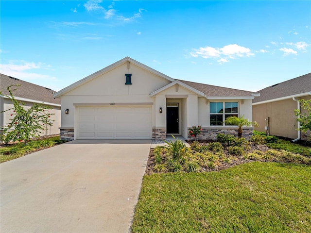 single story home with an attached garage, stucco siding, concrete driveway, and stone siding