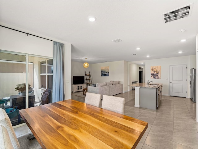 dining area featuring visible vents, recessed lighting, and light tile patterned flooring