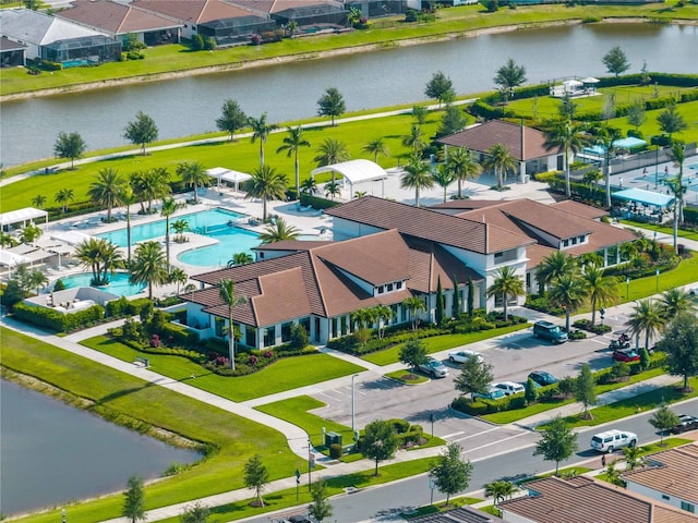 bird's eye view with a water view